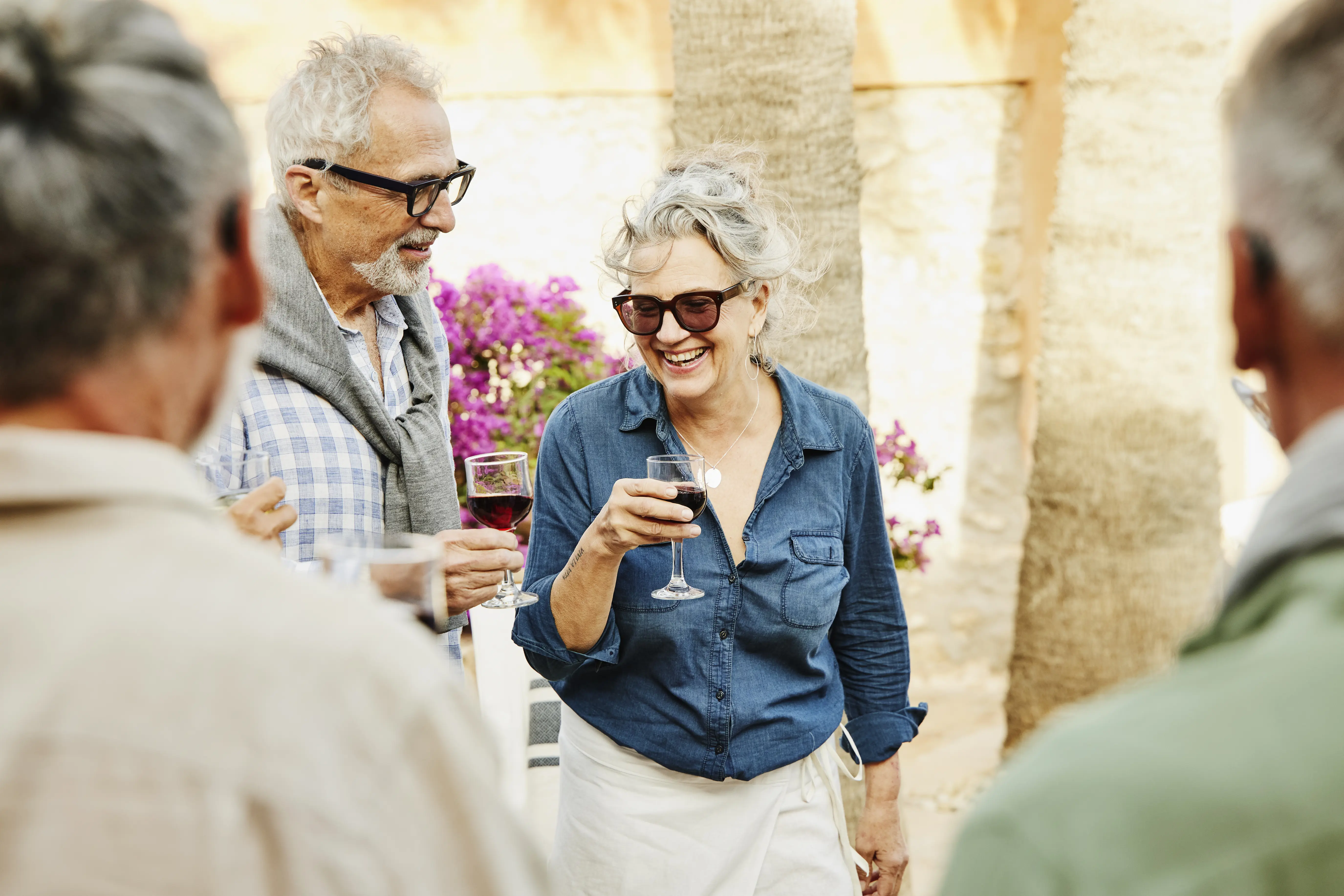 Image of a group of people enjoying wine together.