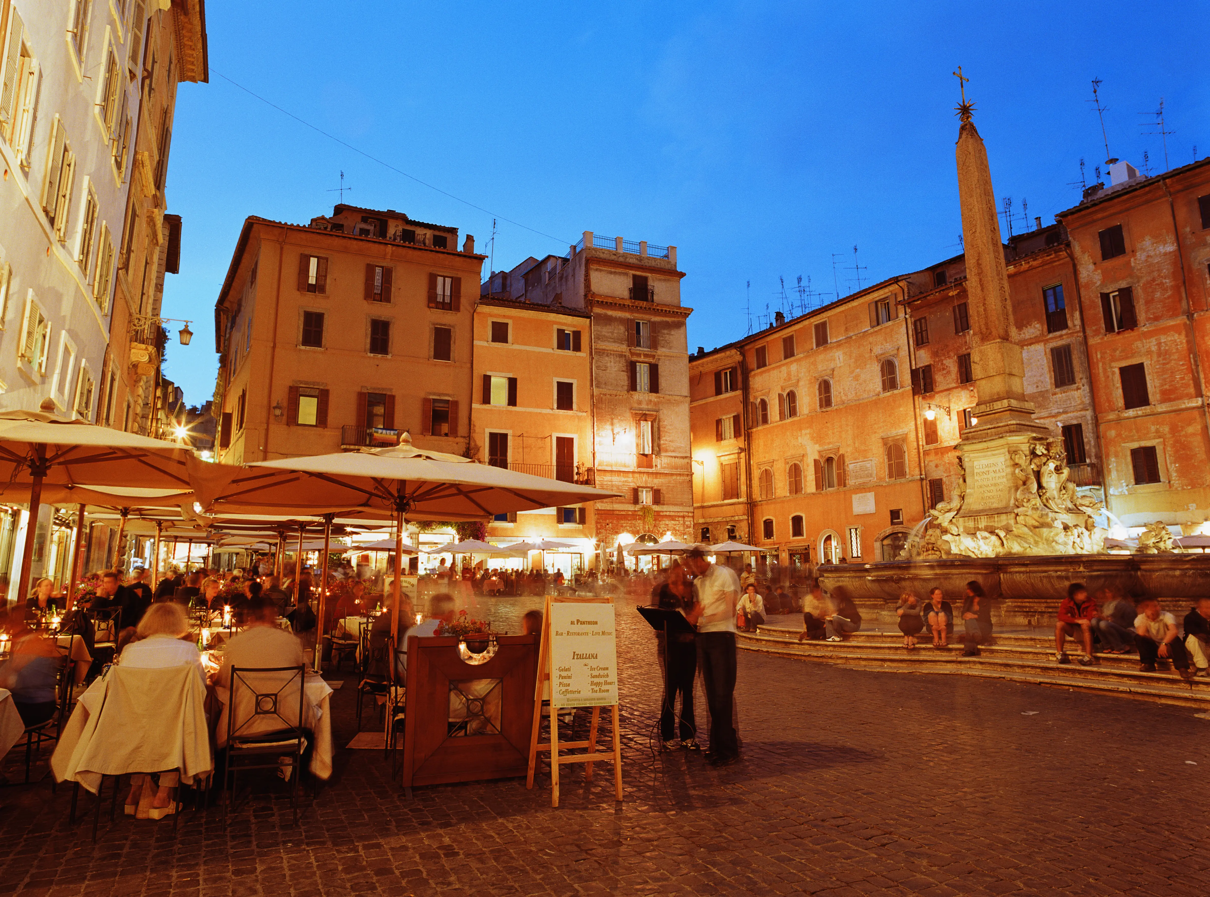 Outdoor evening image of a restaurant in Rome.