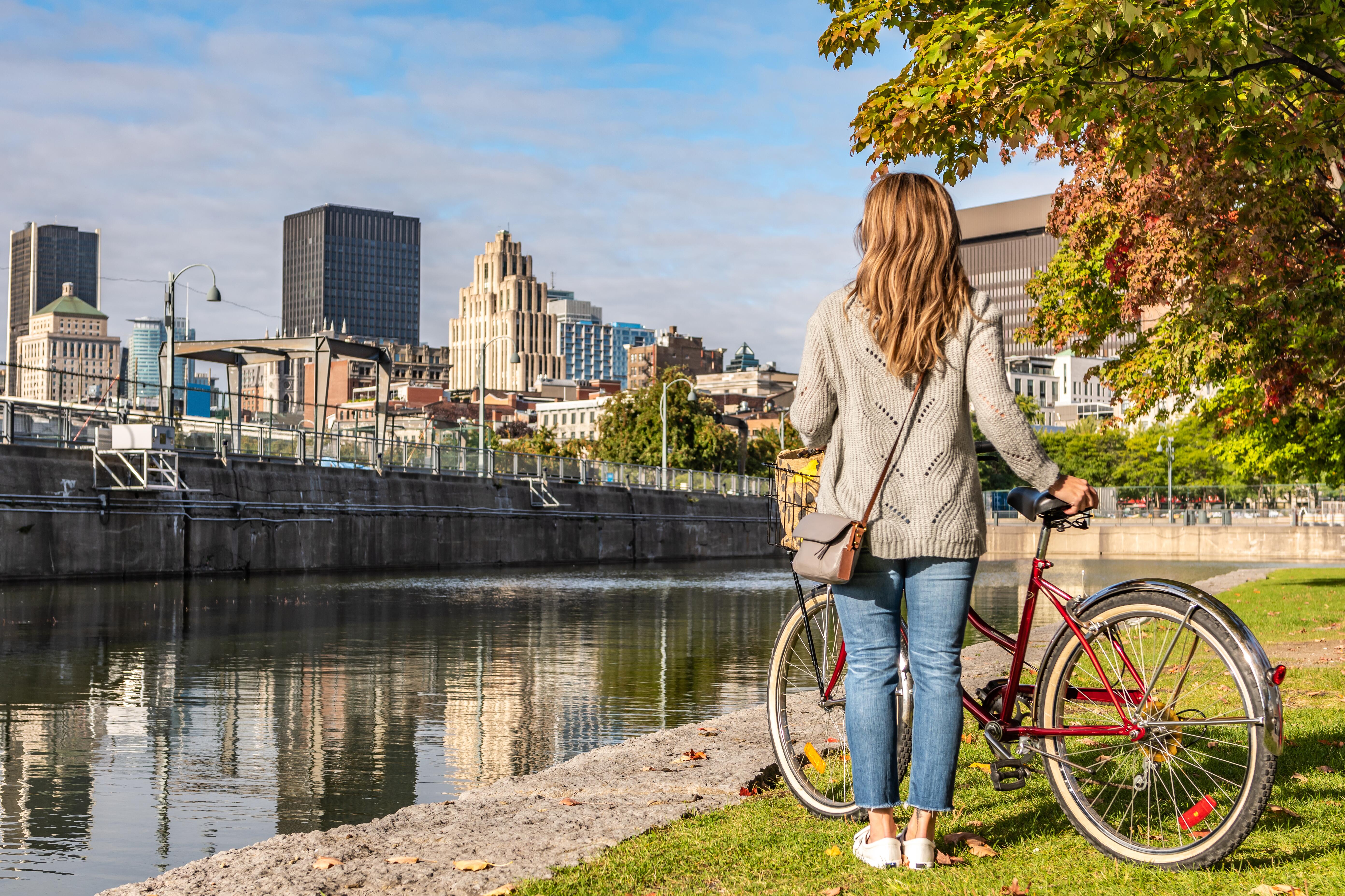 Photo of a woman with a bike in Montreal, Canada