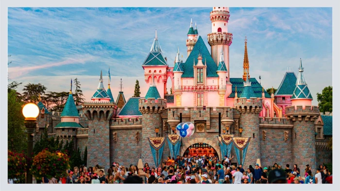  An image of a Walt Disney World castle is captured beneath a clear blue sky.