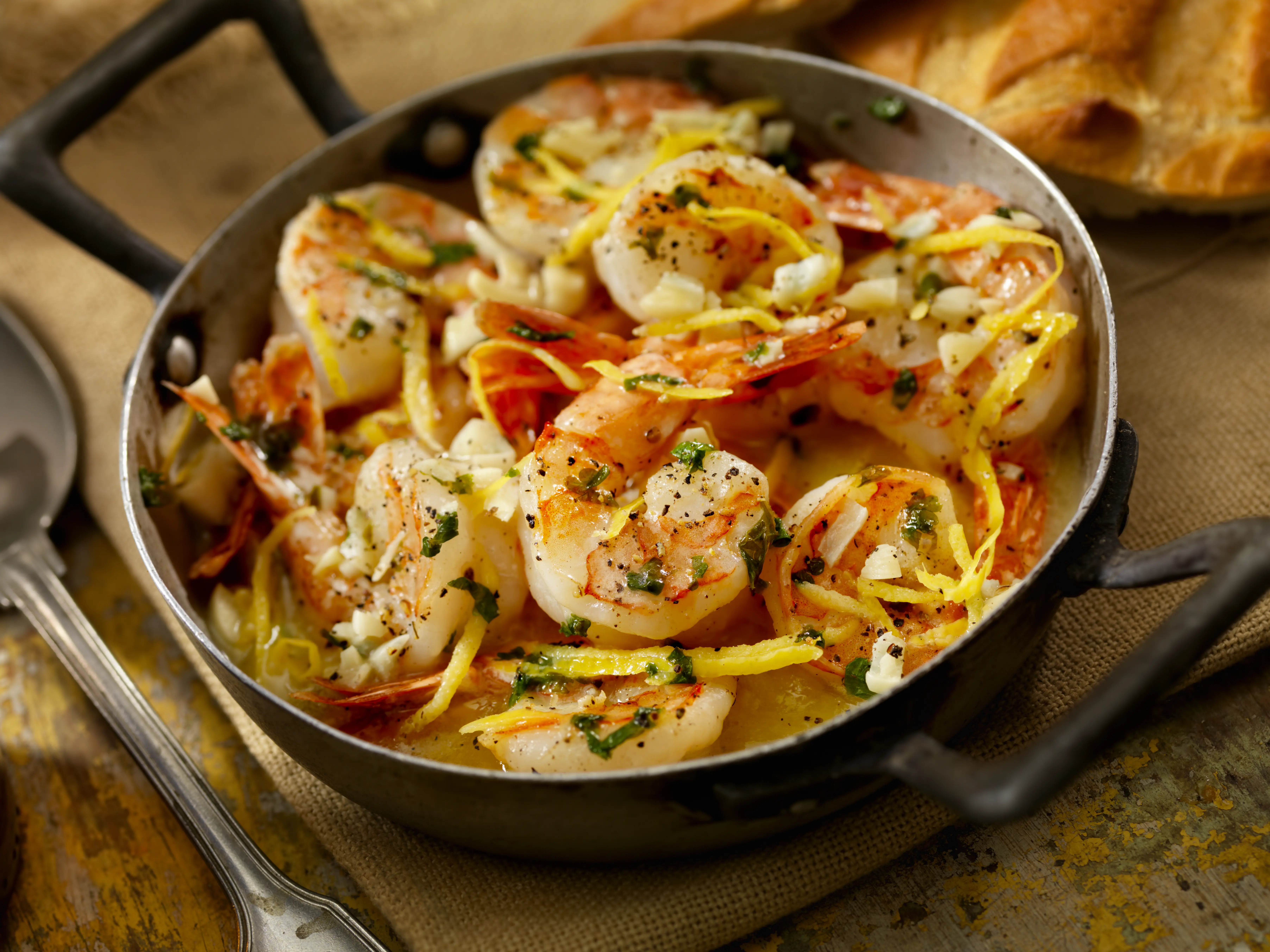 Shrimp scampi in butter, white wine with julienned lemon zest