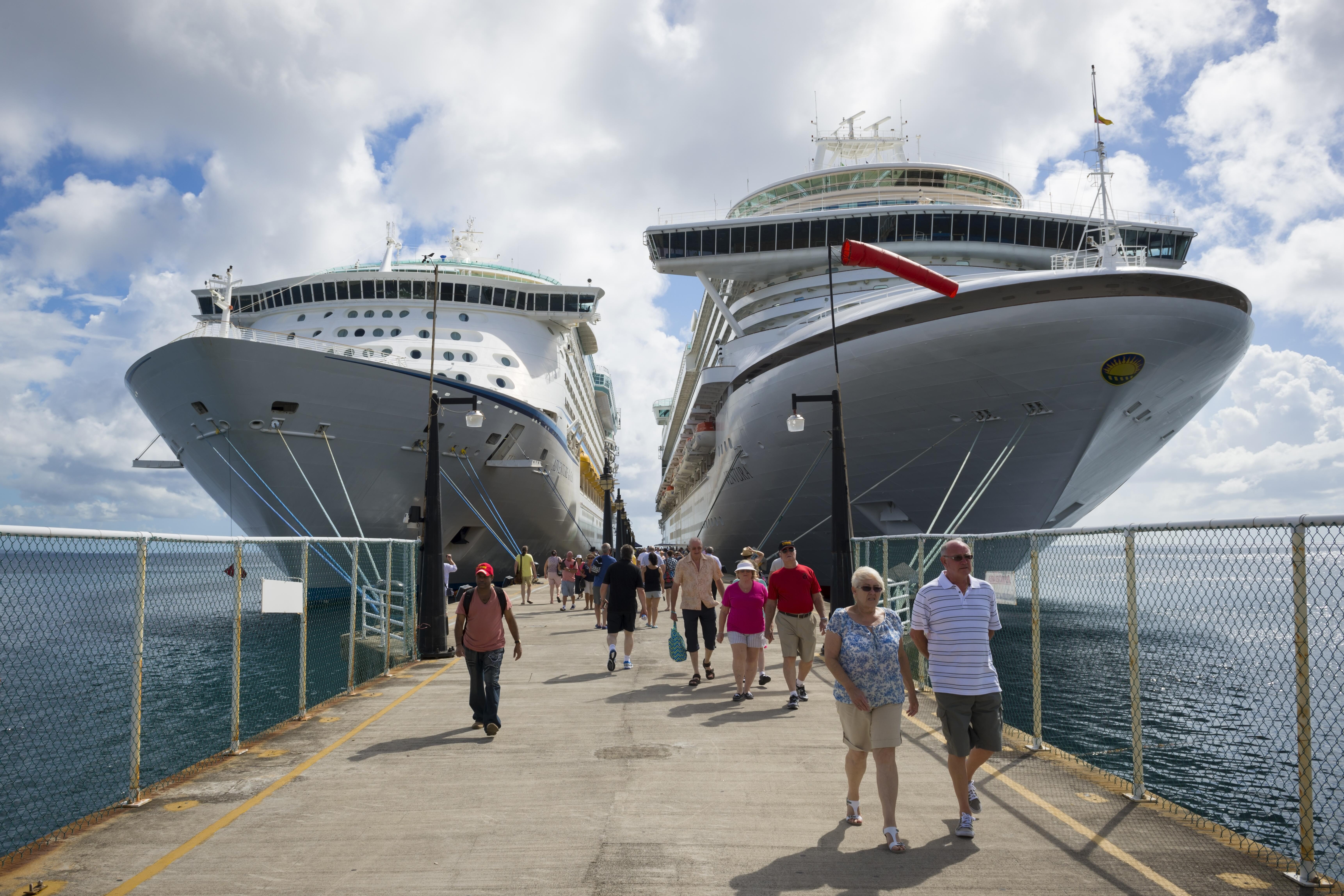 Image of people disembarking a Royal Caribbean cruise ship.