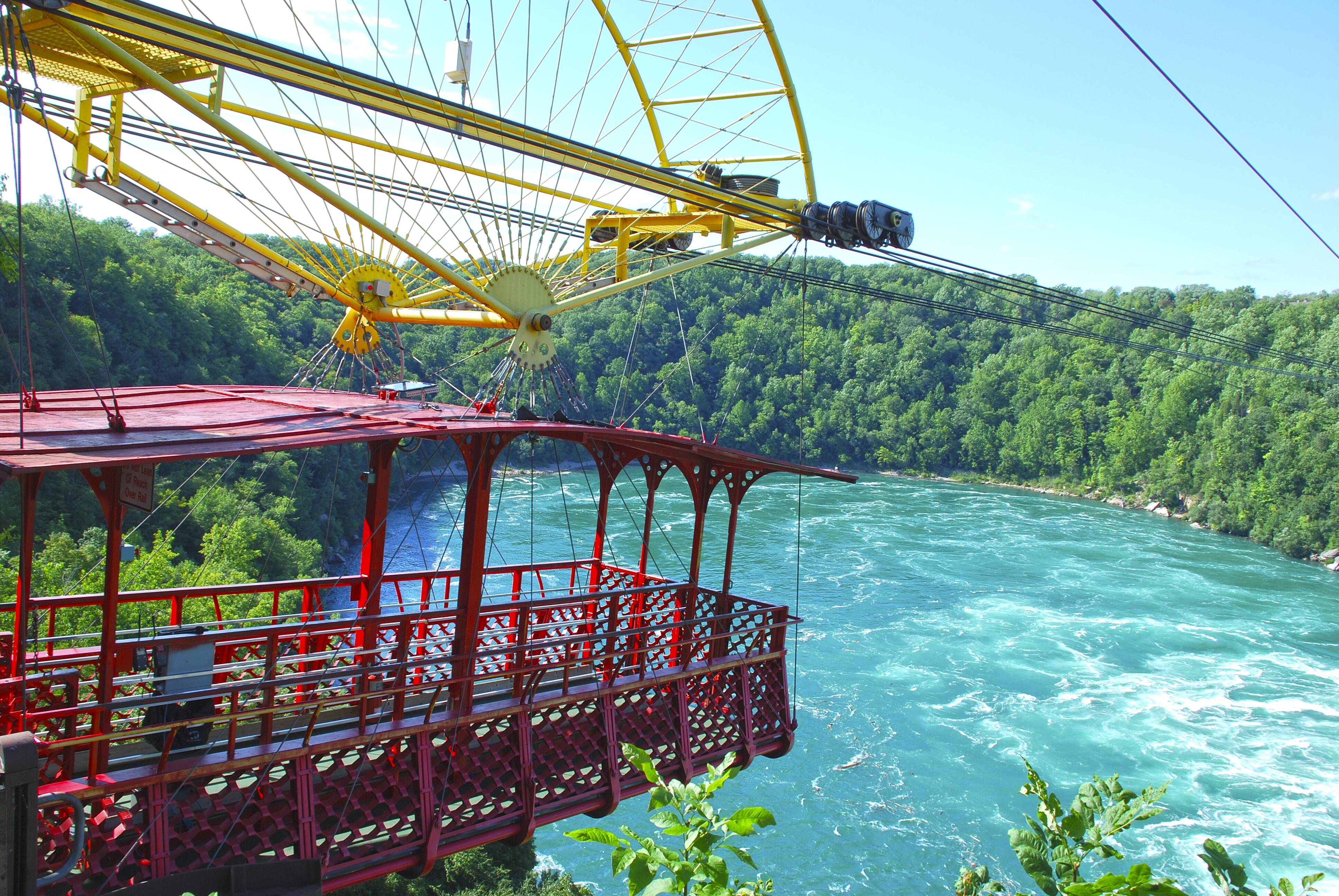 Whirlpool State Park aero car overlooking the water on a sunny day from Canada