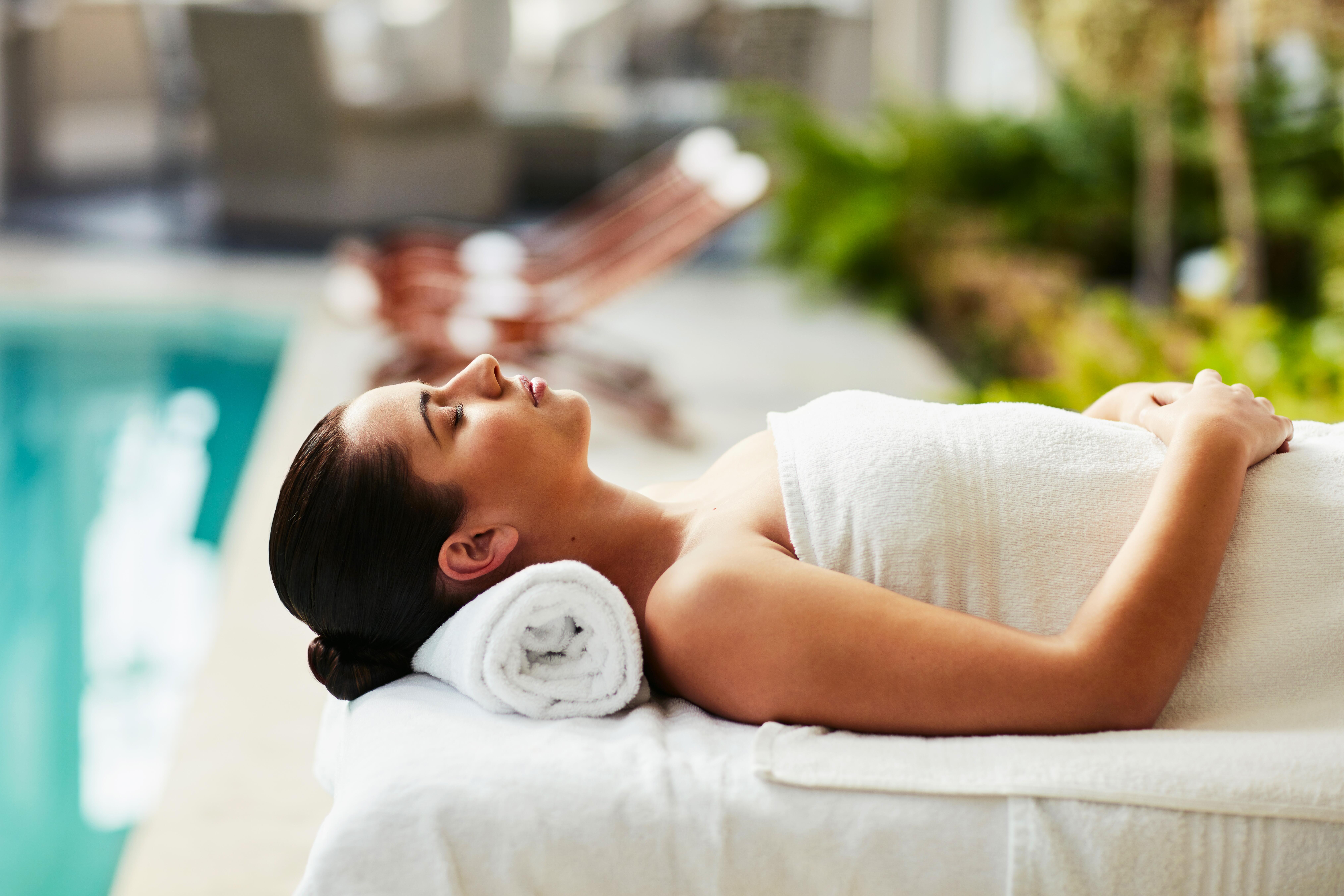 Young woman relaxing after spa therapy at a resort spa