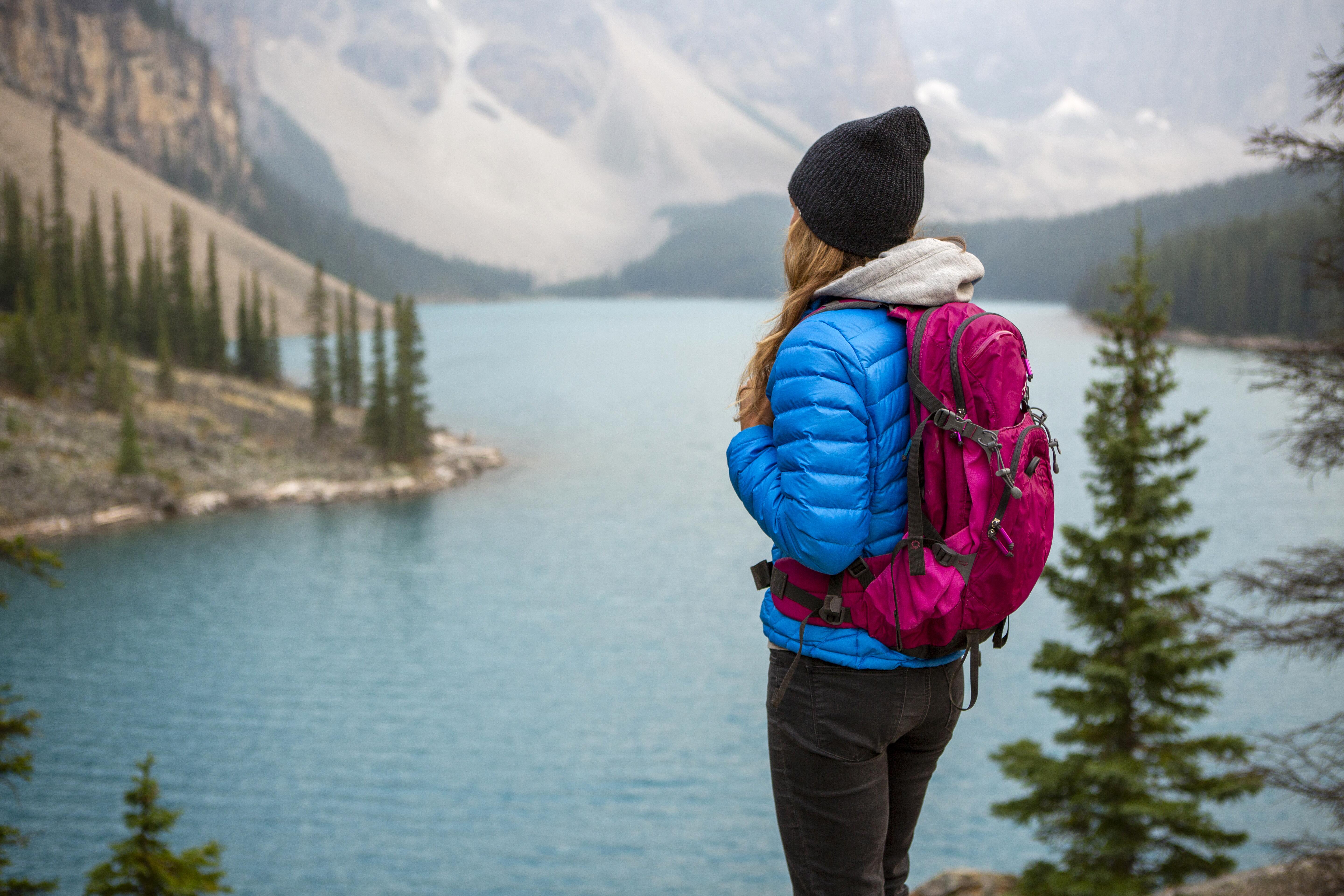 Photo of Woman hiking around Moraine Lake in Banff, Canada