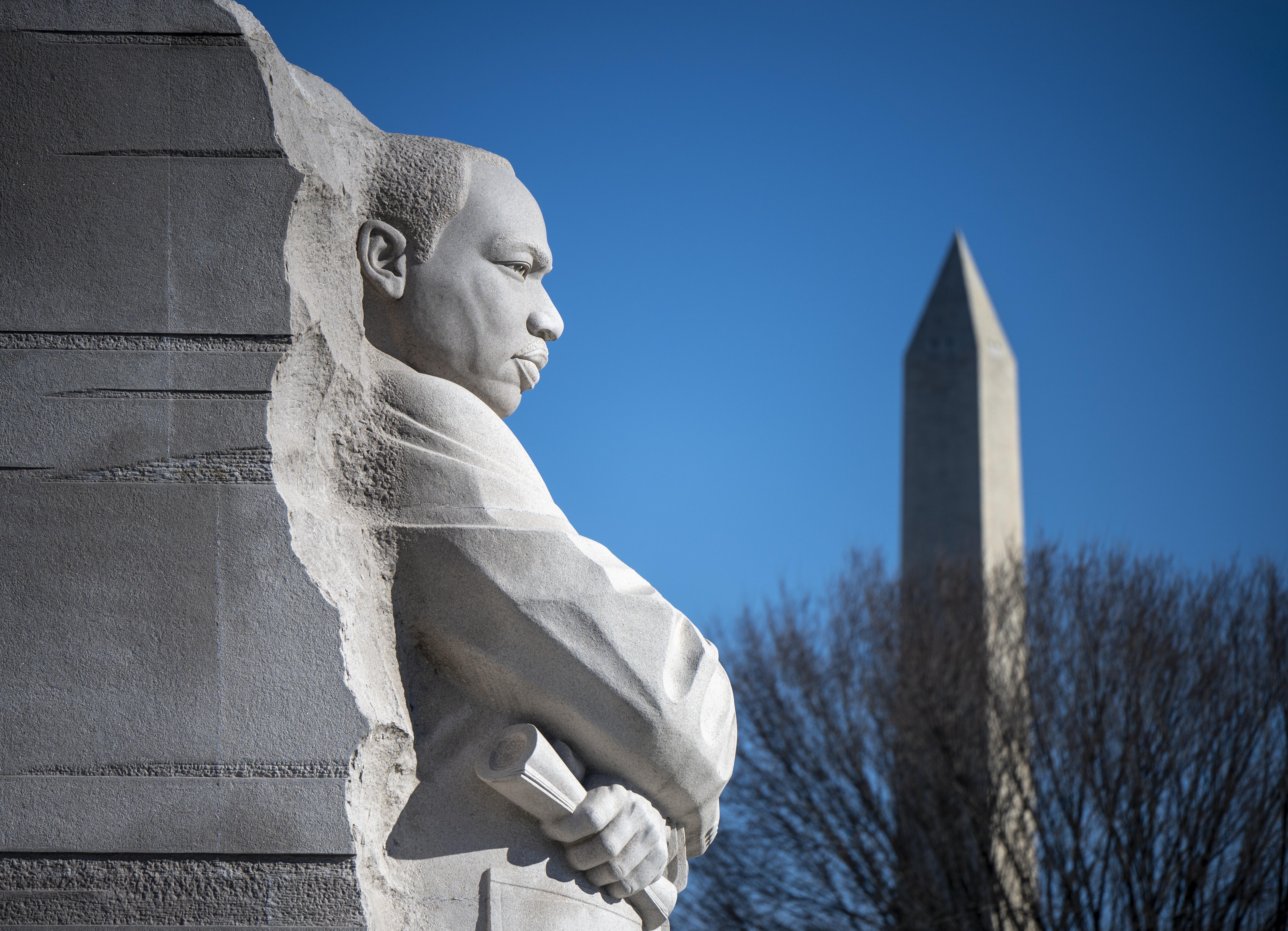 Image of the Martin Luther King Jr. Memorial seen in the foreground, with the Washington Monument visible in the background.