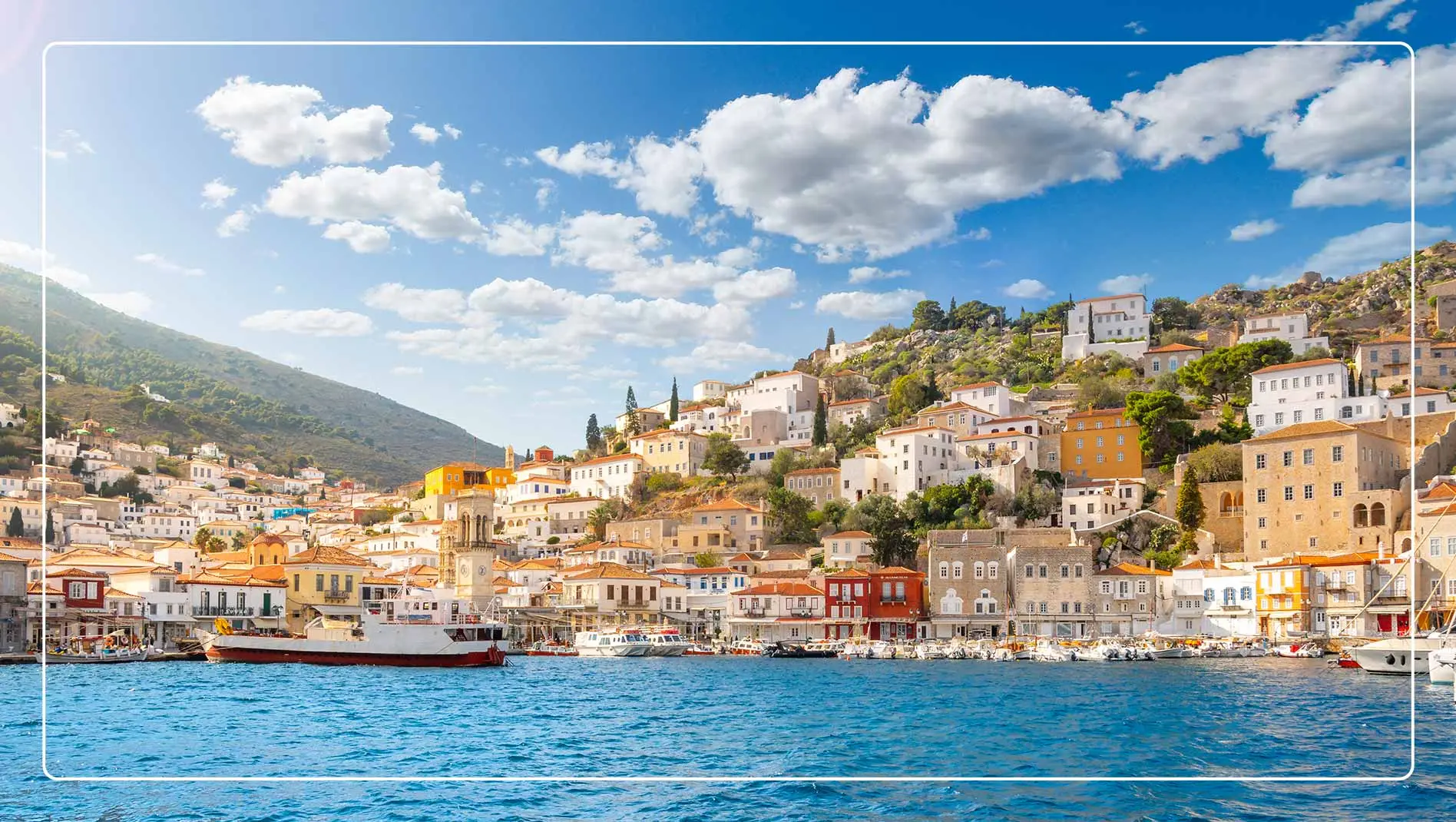 Scene showing fishing boats docked in Hydra, Greece
