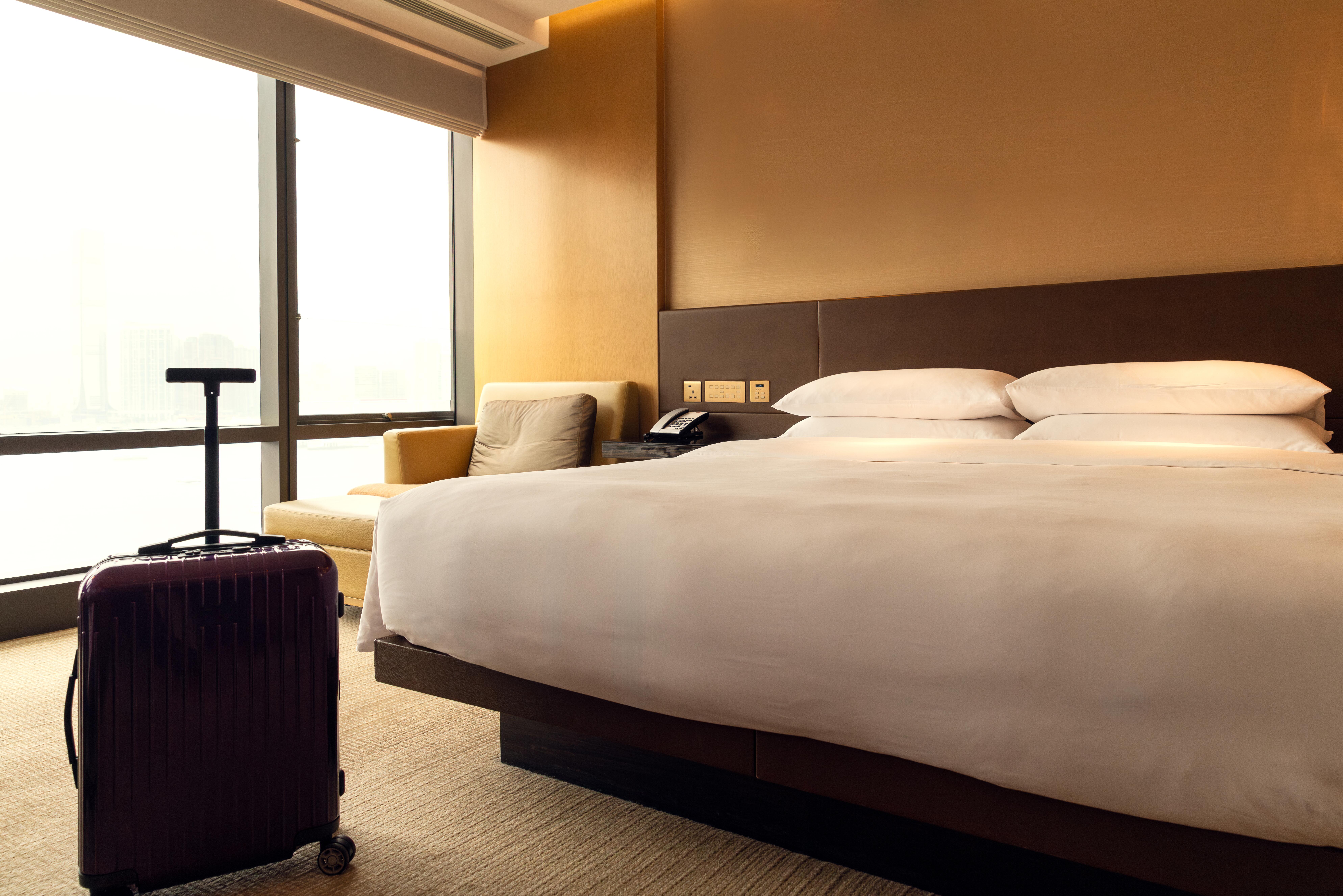 Interior image of a modern, sleek and clean hotel room.