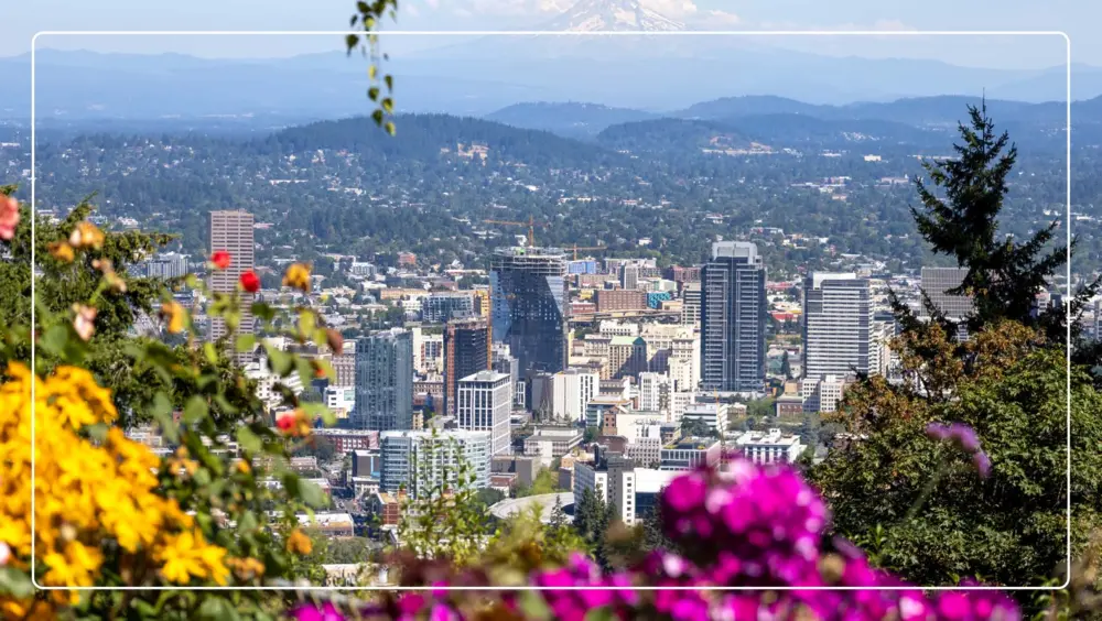 View of downtown Portland with flowers in the foreground.