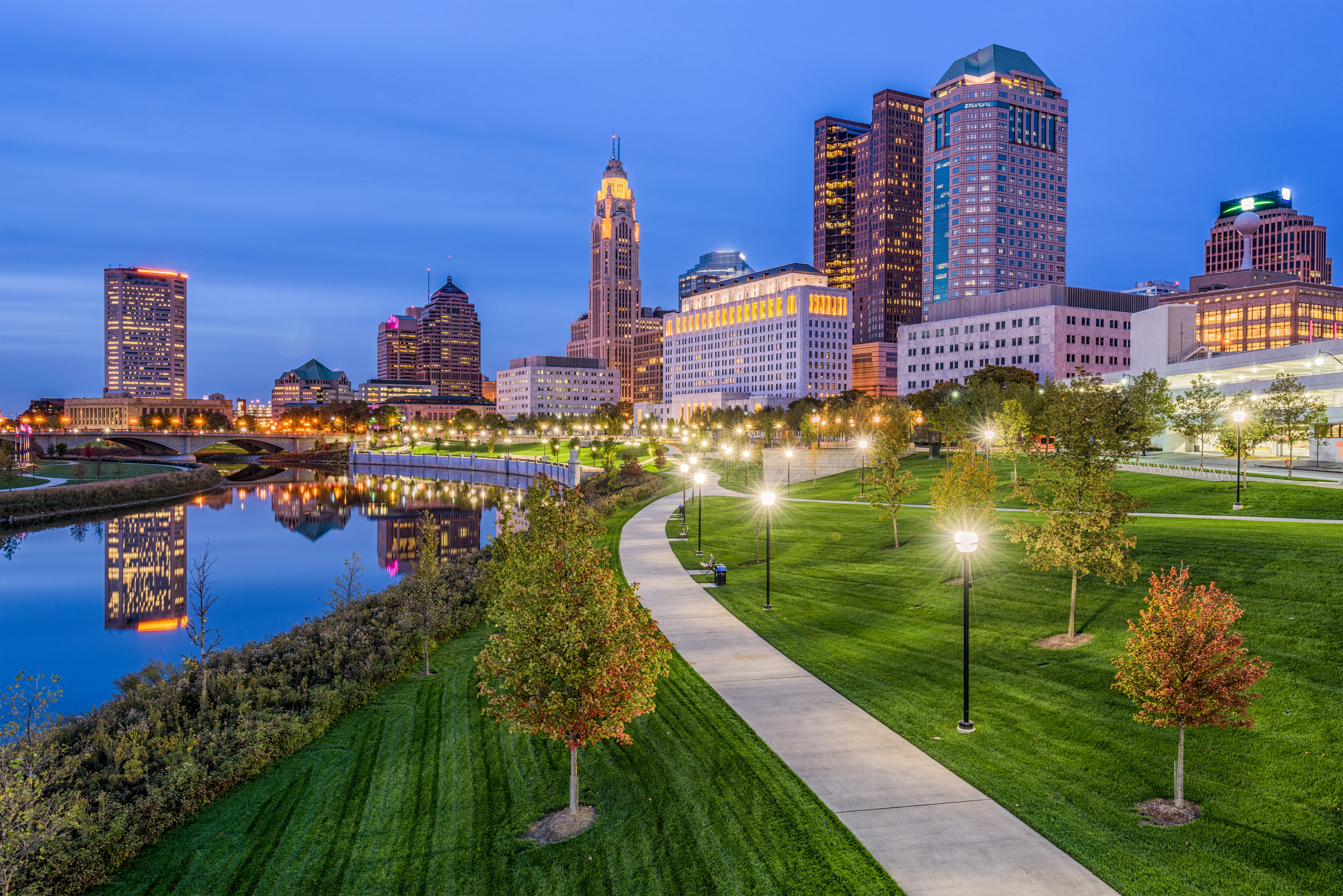 Evening view of Columbus city skyline, Scioto River and park, Ohio