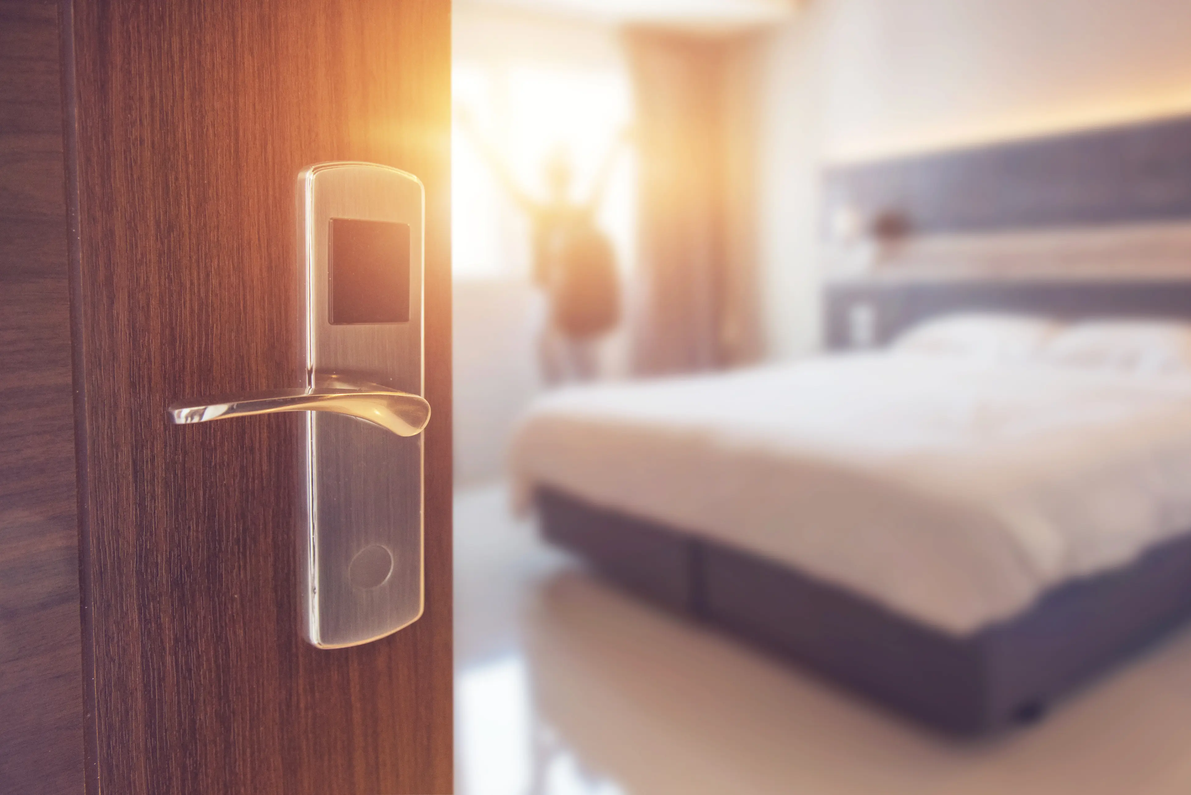 Opened door of a hotel room