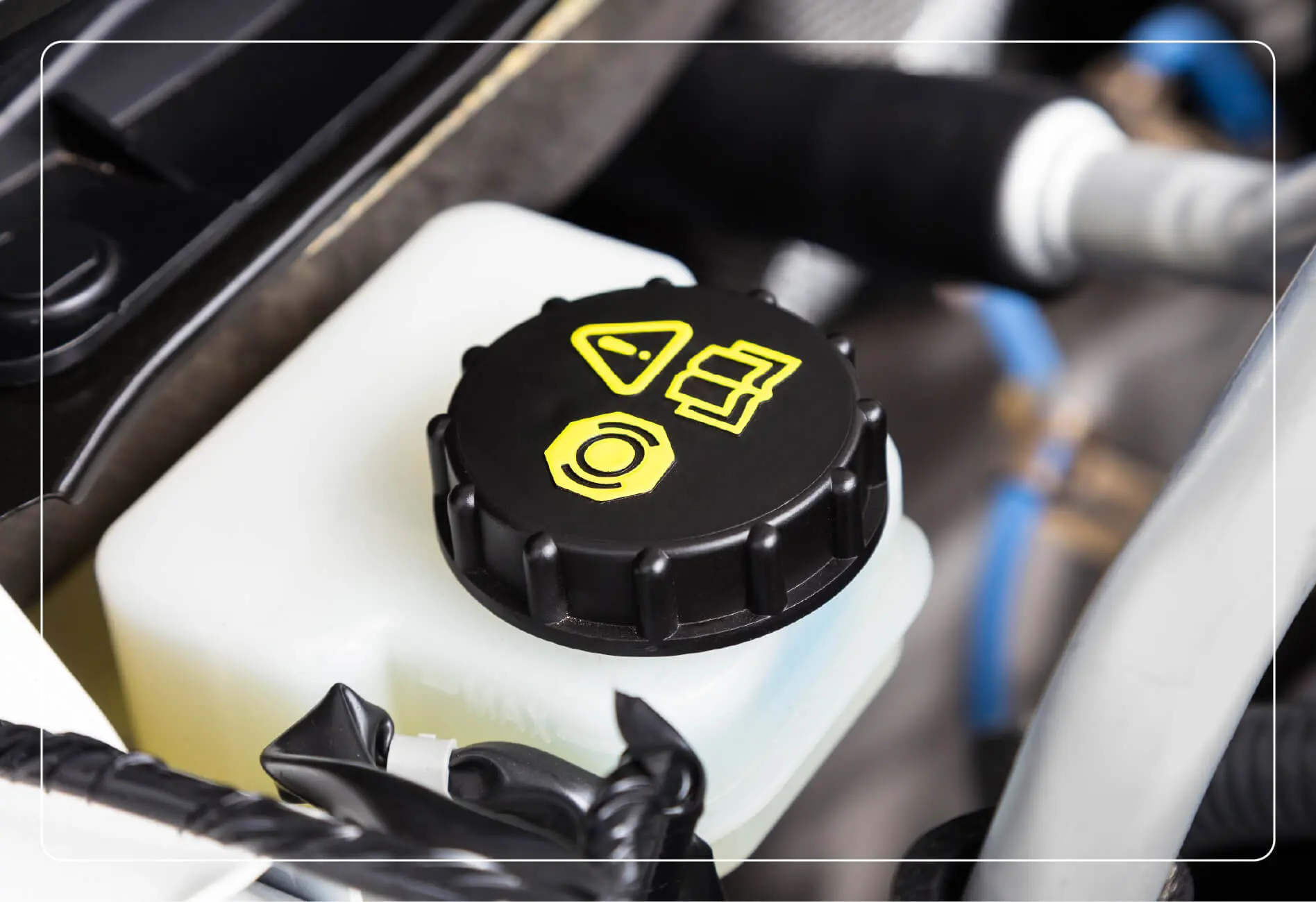 car engine brake fluid container in a car