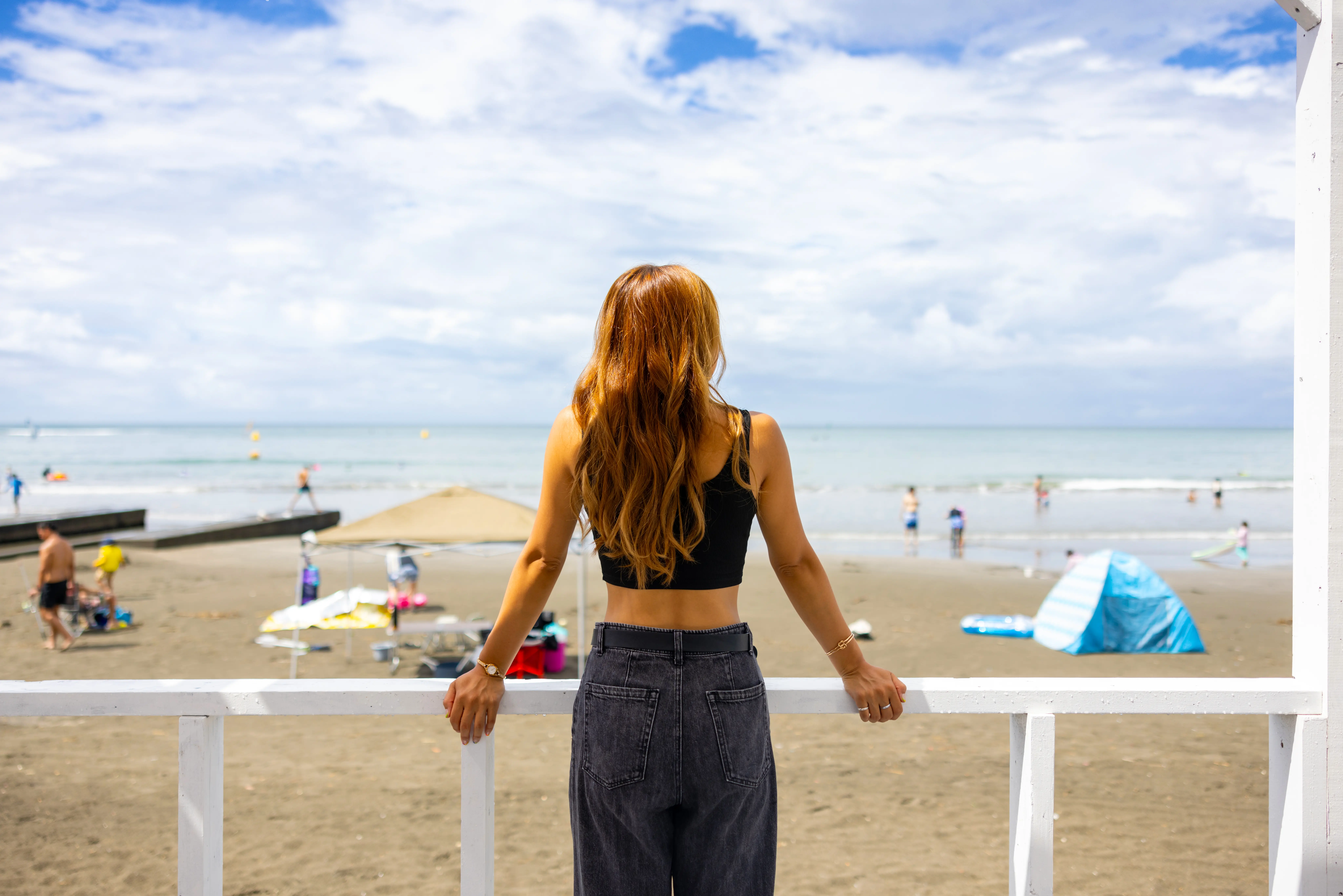 Woman taking in the view at the beach