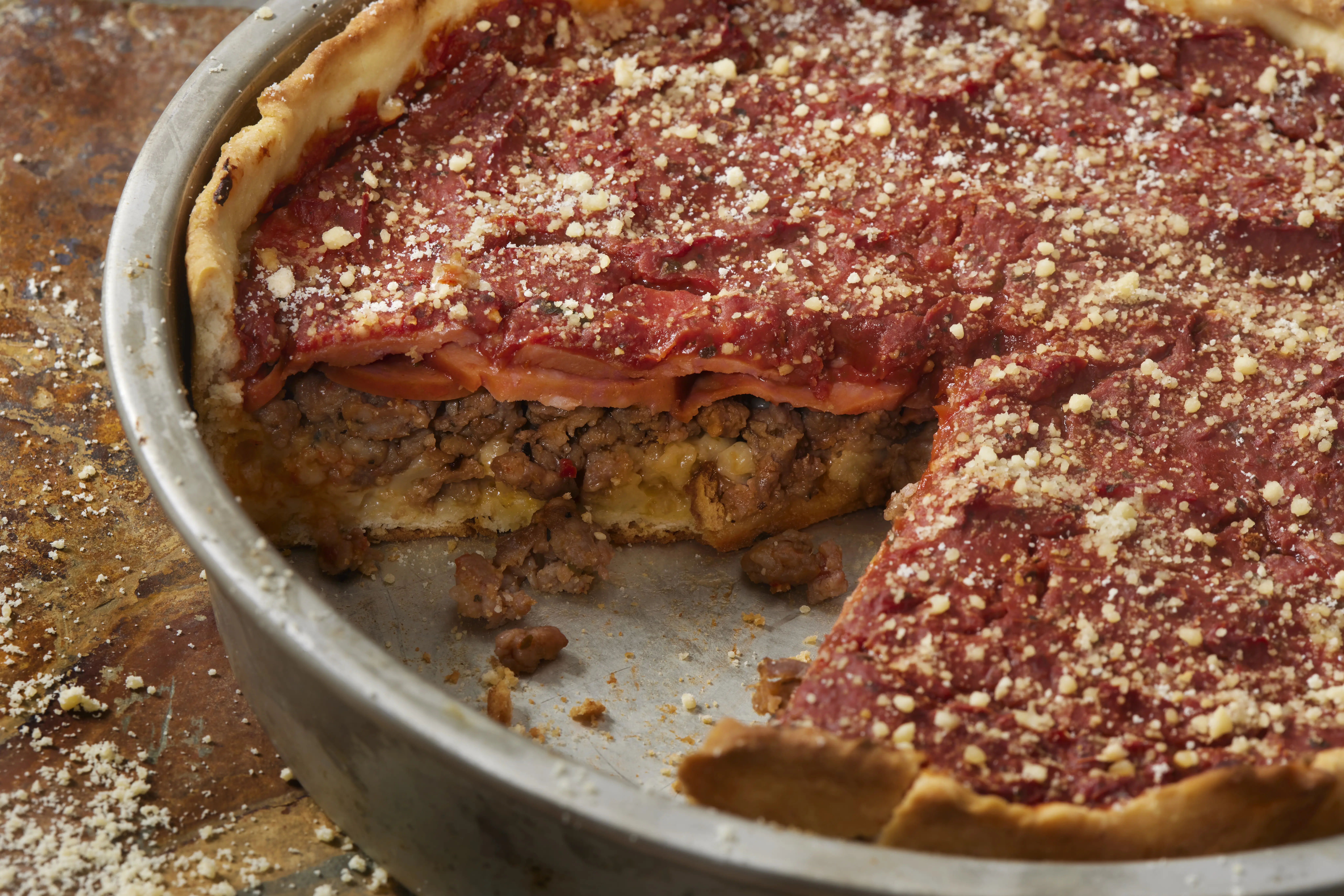 Closeup image of a deep-dish pizza.