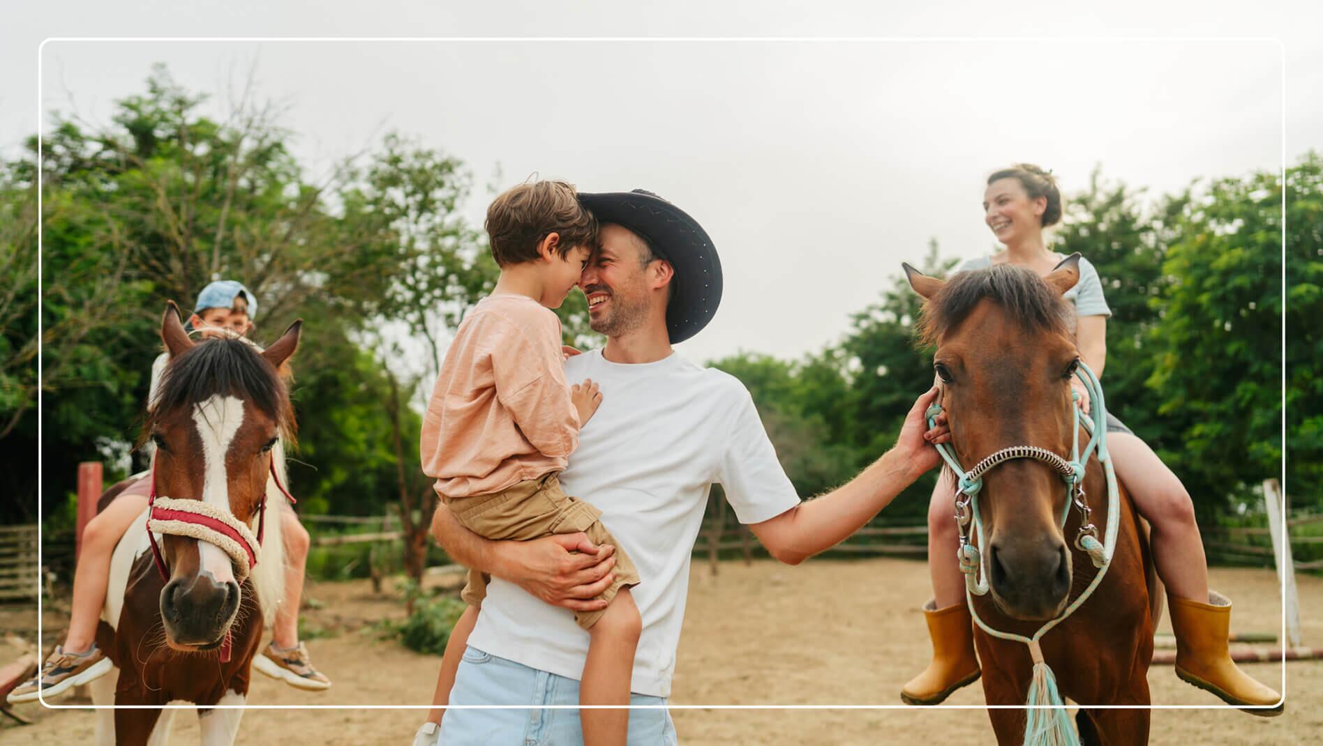 A family enjoying a horseback ride.