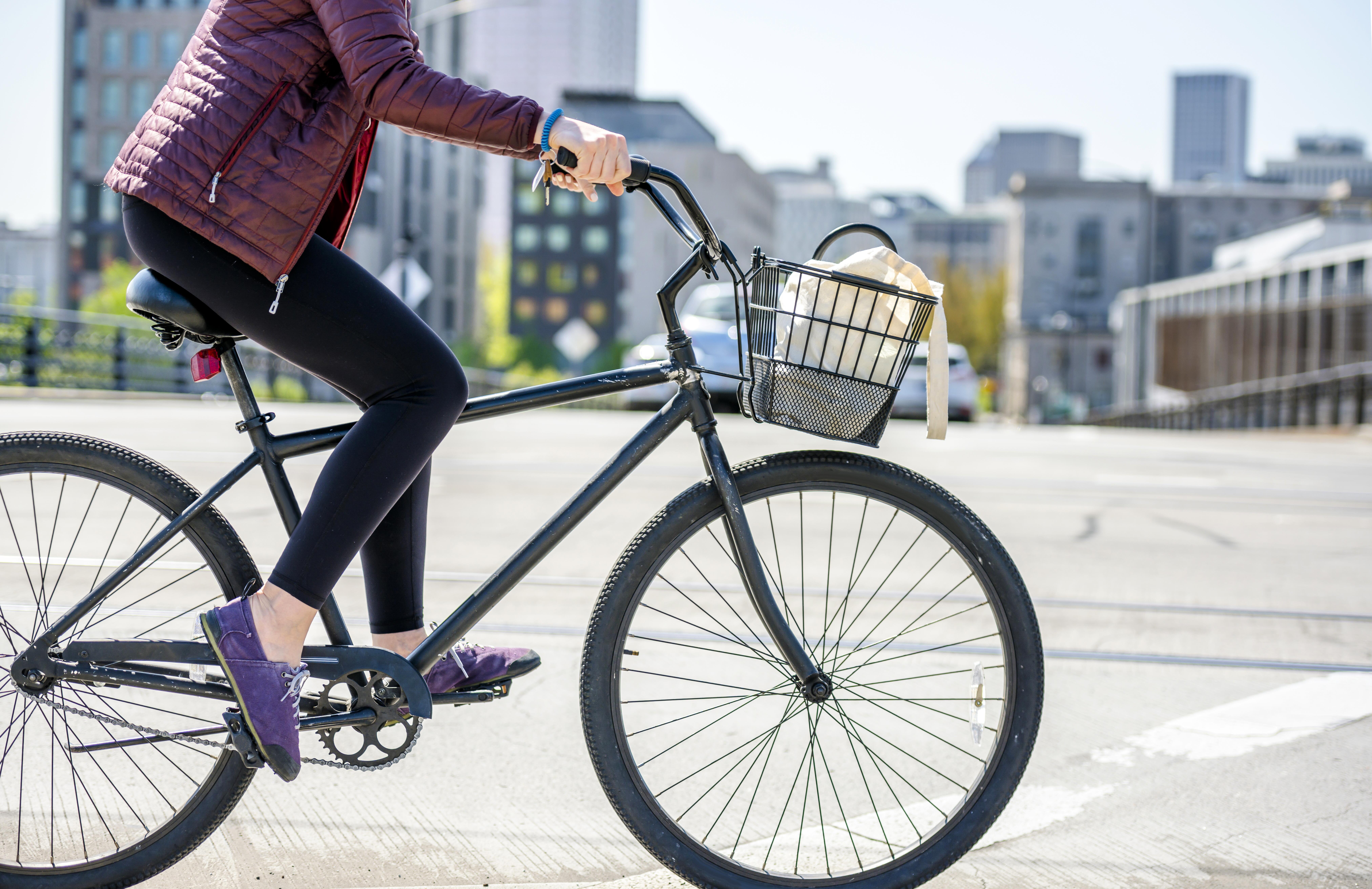 Woman riding a bike in urban environment