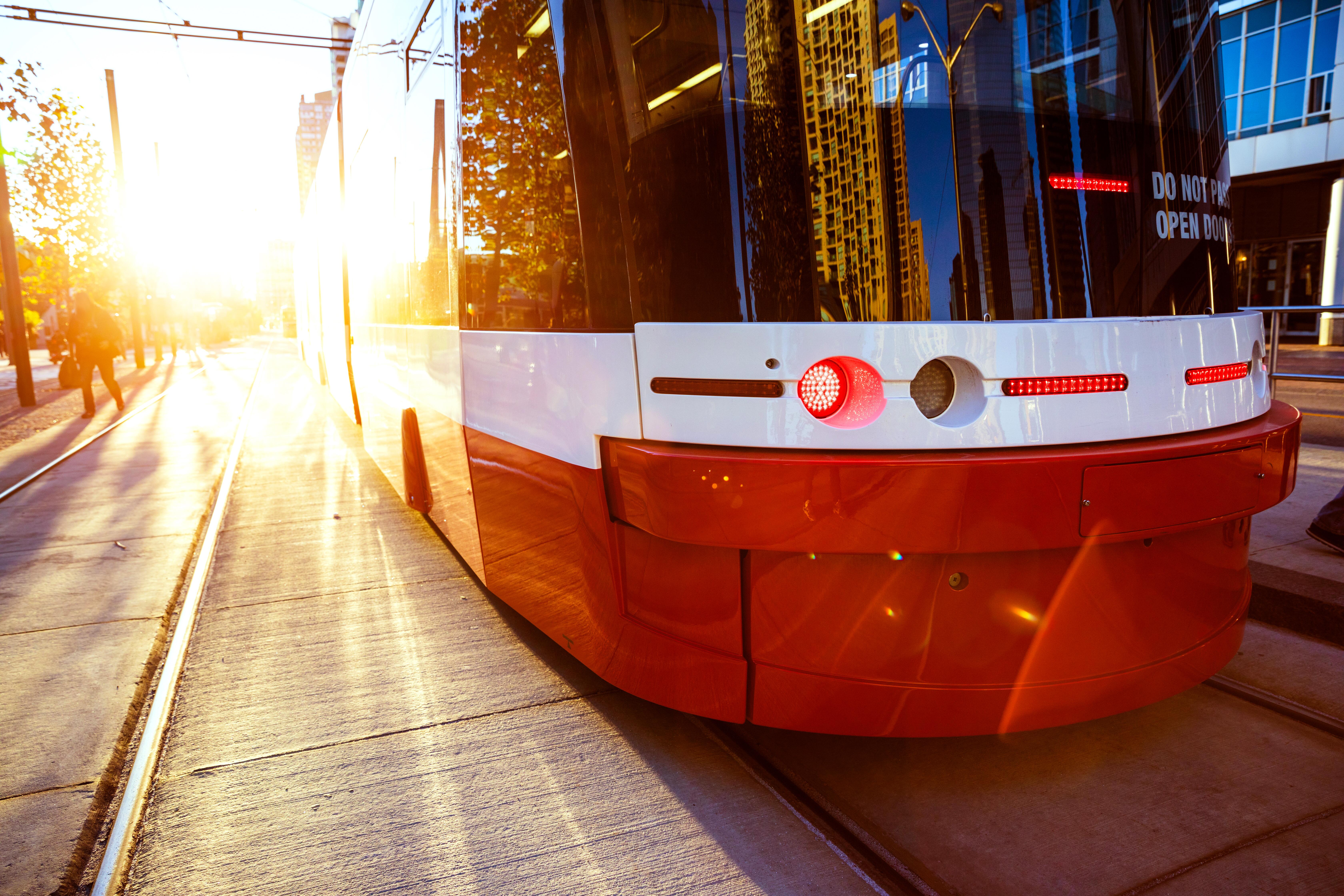 Red Toronto Transit cable car in downtown, daytime