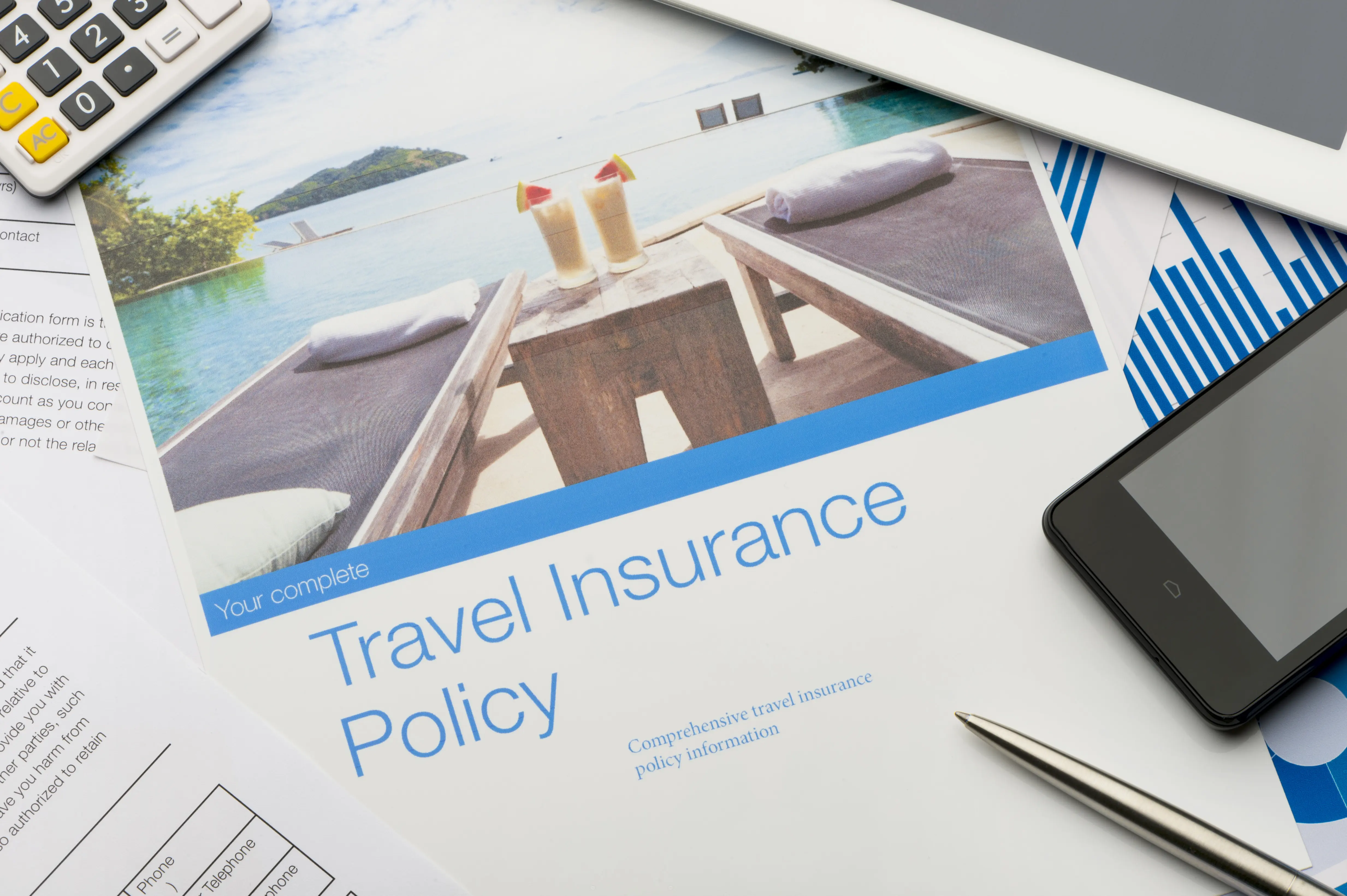 Paperwork showing travel insurance policy