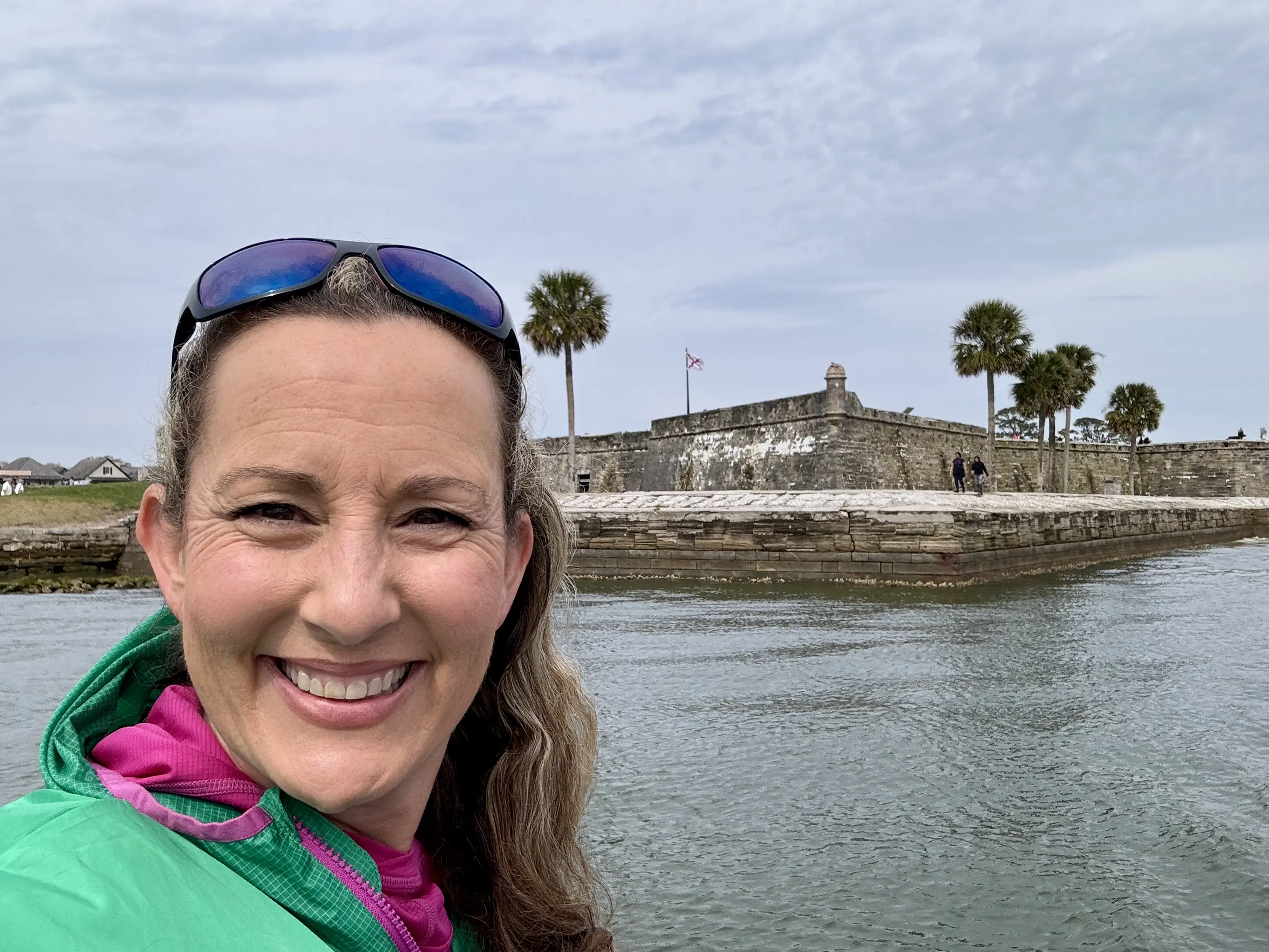 Sel image of Jennifer Broome posing in front of the Castillo de San Marcos fort in St. Augustine.