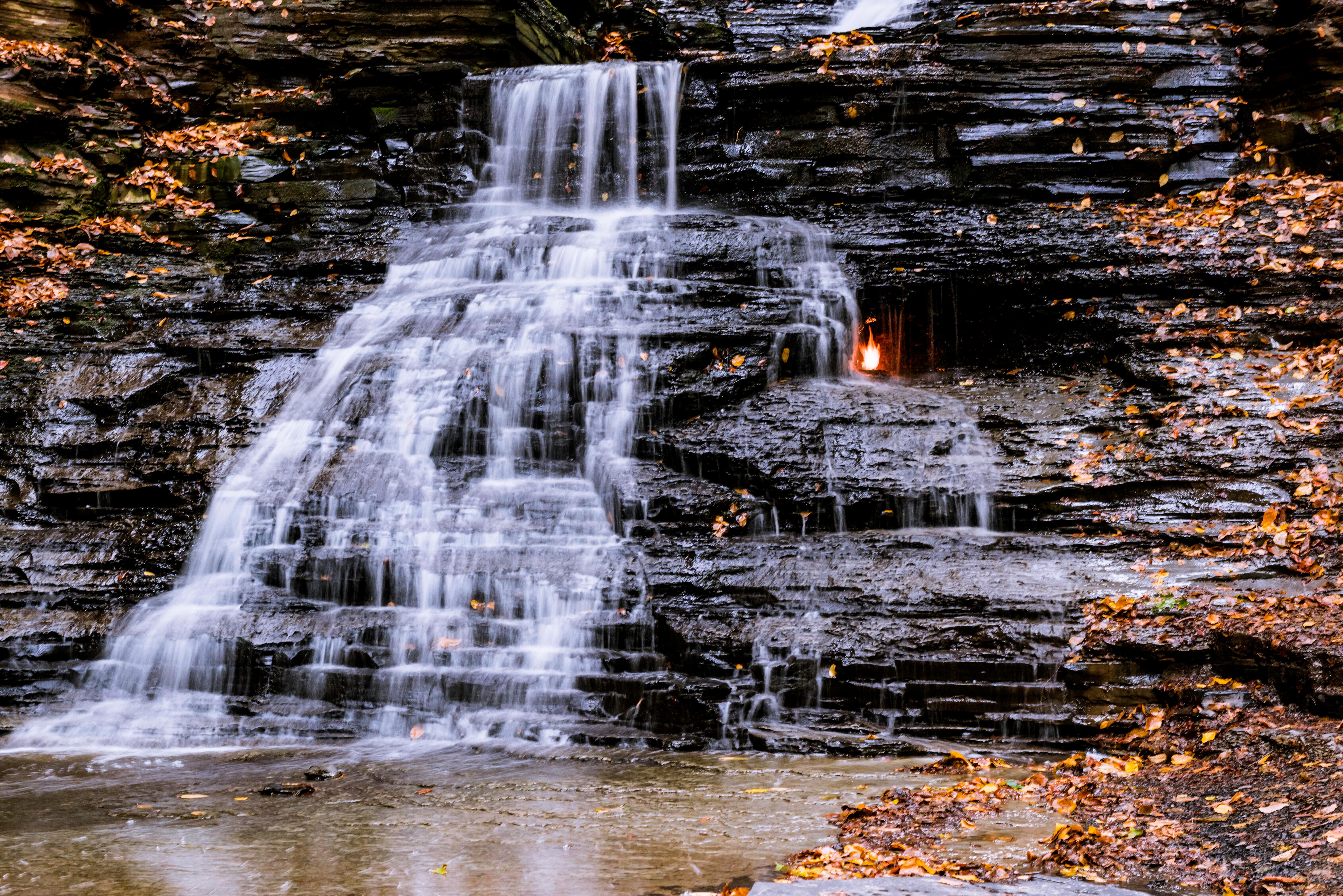 Close-up of eternal flame and waterfall in Shale Creek Preserve, a section of Chestnut Ridge Park in Western New York, USA
