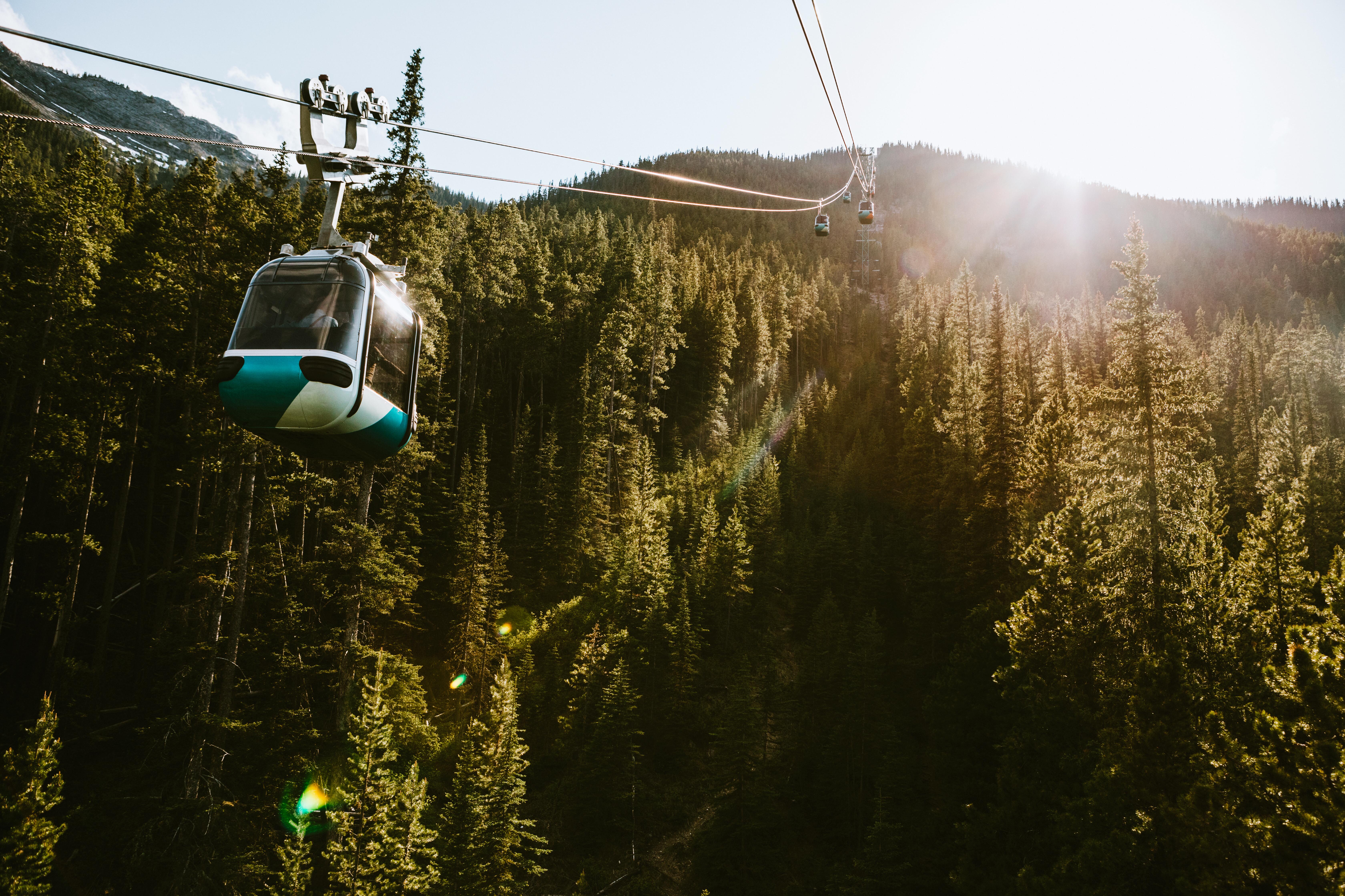 Photo of Gondola Lift going up a mountain in Banff, Canada